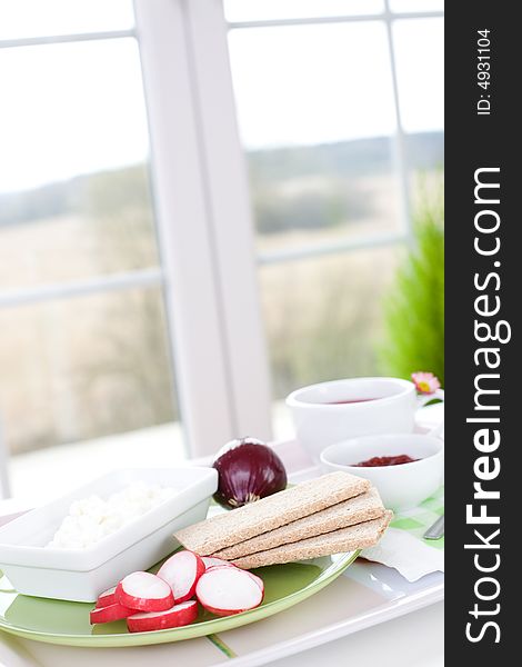 Healthy breakfast / Cottage cheese, radish, red onion and crack bread