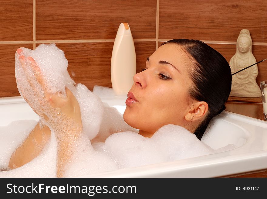 Woman Relaxing In Bath