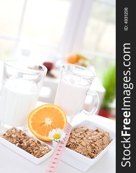 Healthy and delicious breakfast / cereal, yoghurt, orange