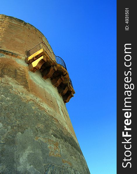 Ancient Tuna fishing construction Tonnara Bordonaro XVI century in Palermo. View on Mount Pellegrino blue sky and sea. Island of Sicily, Italy. Ancient Tuna fishing construction Tonnara Bordonaro XVI century in Palermo. View on Mount Pellegrino blue sky and sea. Island of Sicily, Italy