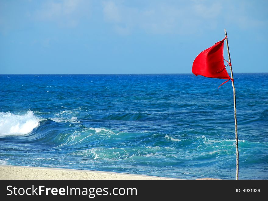 A red flag that indicates if you can get into the sea. A red flag that indicates if you can get into the sea