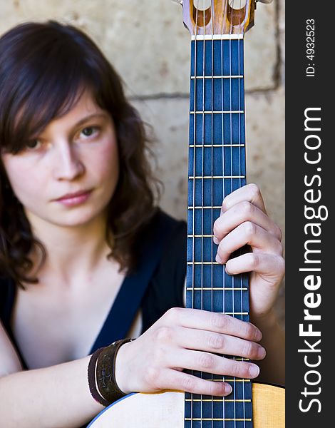 Soft focused guitar performer portrait. Soft focused guitar performer portrait.