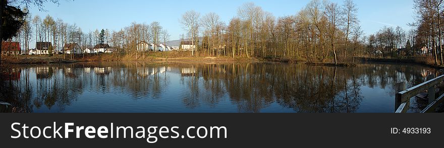 Lake panorama with at sunrise