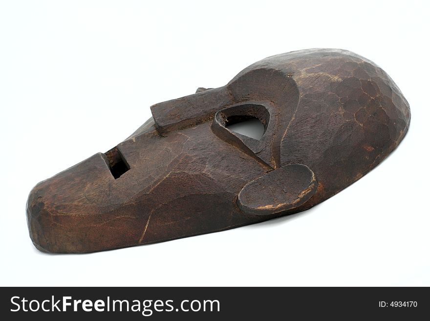 Handmade antique african mask, isolated