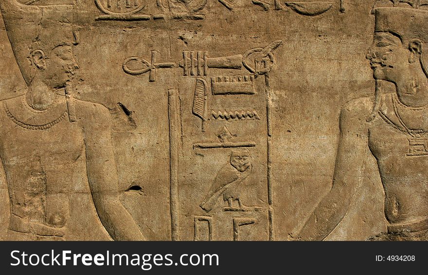 Old egyptian basrelief and hieroglyphs