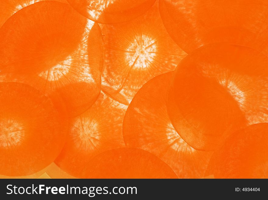 Carrot cut into thin slices. Carrot cut into thin slices
