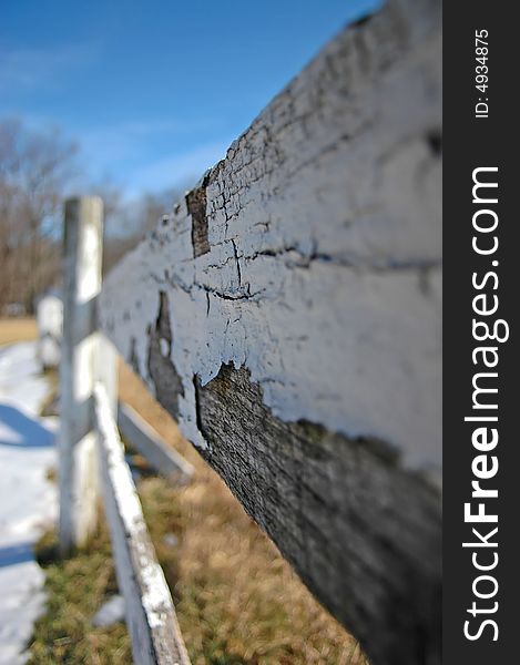 Decaying wooden fence at an abandoned horse farm