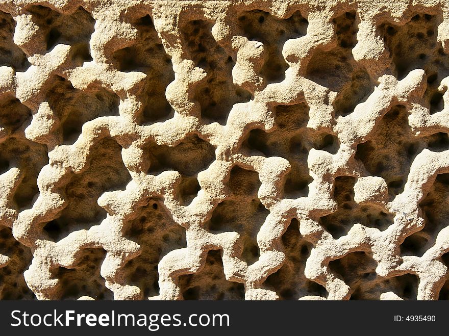 Close up detail of raised textured  sandstone wall. Close up detail of raised textured  sandstone wall