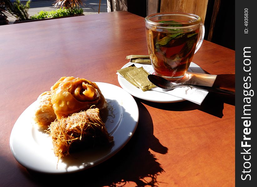 Morning tea and cake on a wooden table