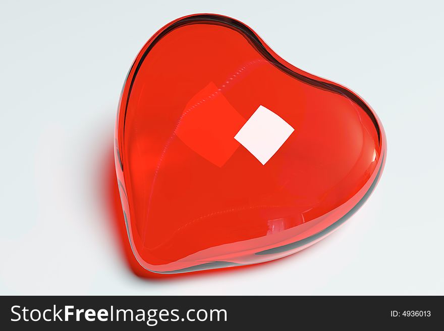 Red glass heart on the white background