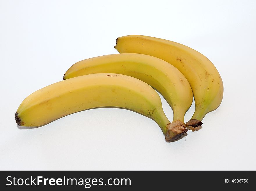 Photo of three yellow bananas