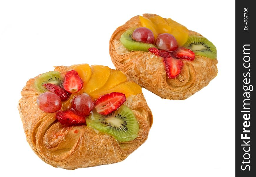 Rich rolls with fruit isolated on a white background