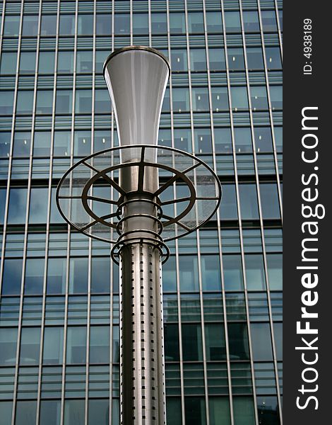 Steel outdoor light in front of office building