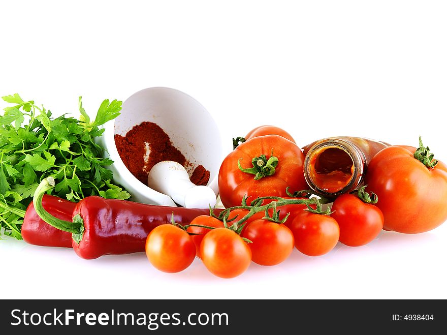 Raw fresh ingredients for sause over white background