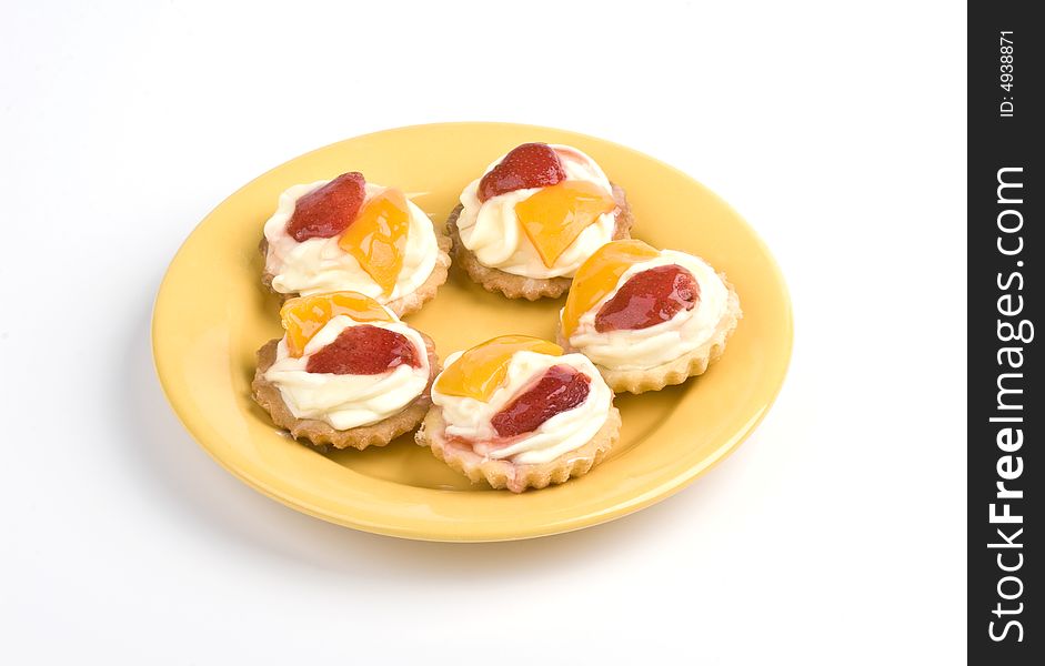 Fruit cookies on yellow plate