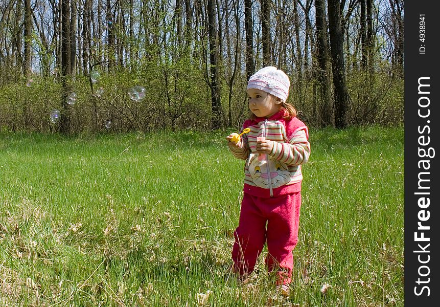 Child Blowing Bubbles