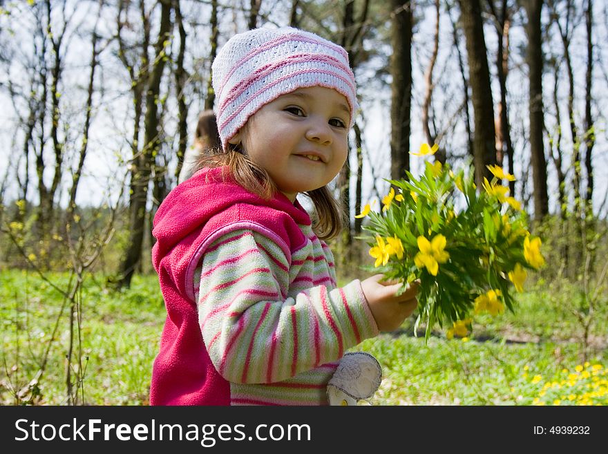 Little girl with bunch of flowers. Little girl with bunch of flowers