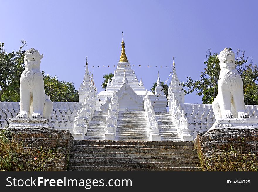 Myanmar, mingun: Statues representing seated buddha's sculptures outside the mingun pagoda. Myanmar, mingun: Statues representing seated buddha's sculptures outside the mingun pagoda