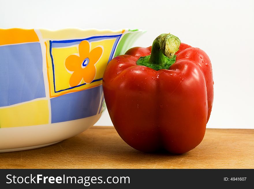 Red pepper in kitchen isolated