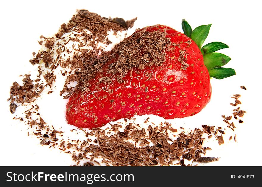 Photo of a juicy ripe strawberry with ice-cream and chocolate
