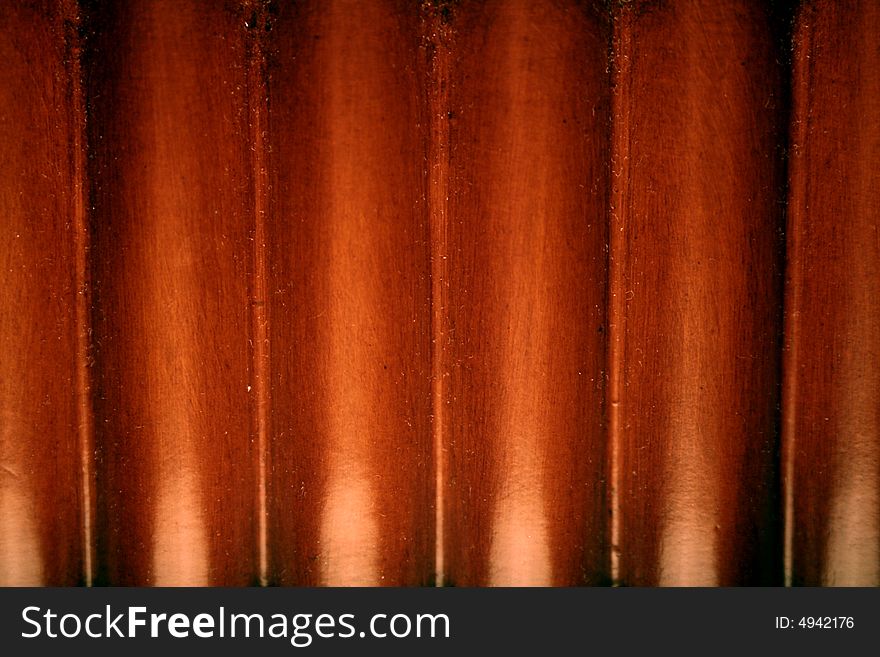 A close-up of a red wooden background. A close-up of a red wooden background.