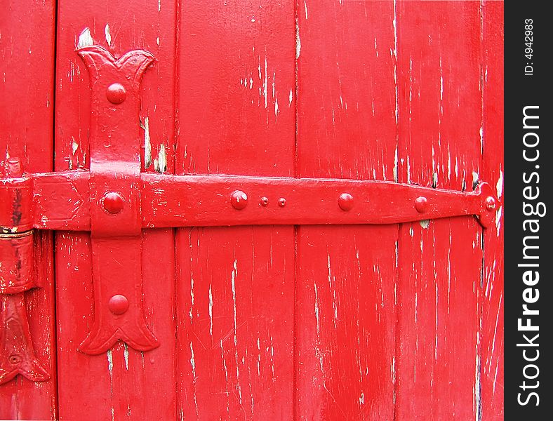 Locked red wooden door with old metal lock. Locked red wooden door with old metal lock