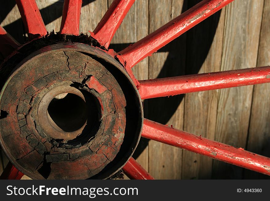 Worn Red Wagon Wheel