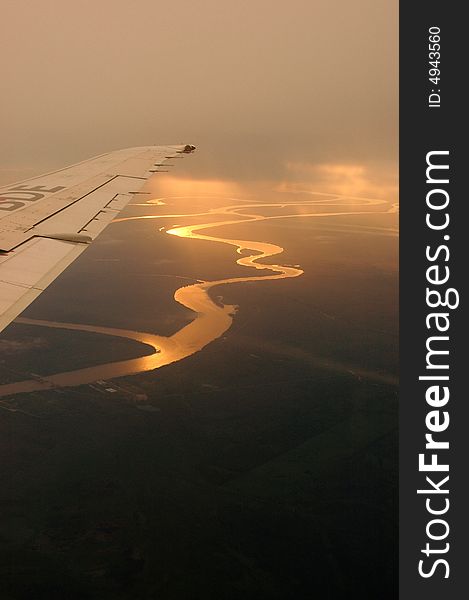 The Lujan river reflecting the sun light from a plane. The Lujan river reflecting the sun light from a plane