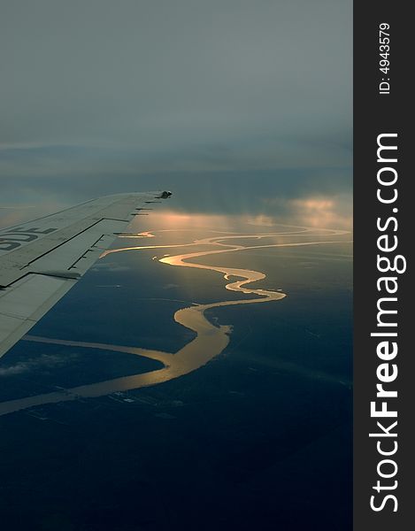 The Lujan river reflecting the sun light from a plane. The Lujan river reflecting the sun light from a plane
