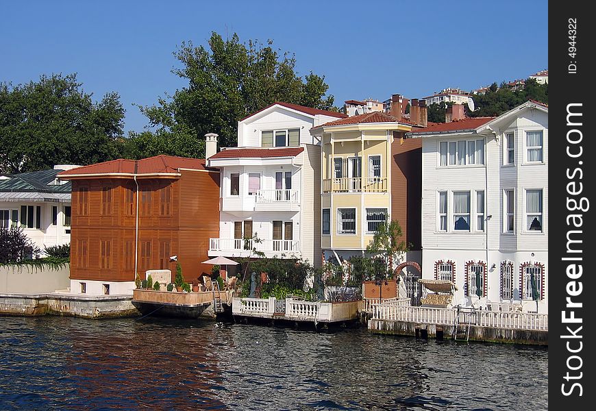 Homes along the Bosporus waterway in Turkey connecting the Mediterranean Sea with the Black Sea. Homes along the Bosporus waterway in Turkey connecting the Mediterranean Sea with the Black Sea