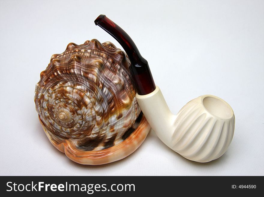 My white tobacco pipe on white background.