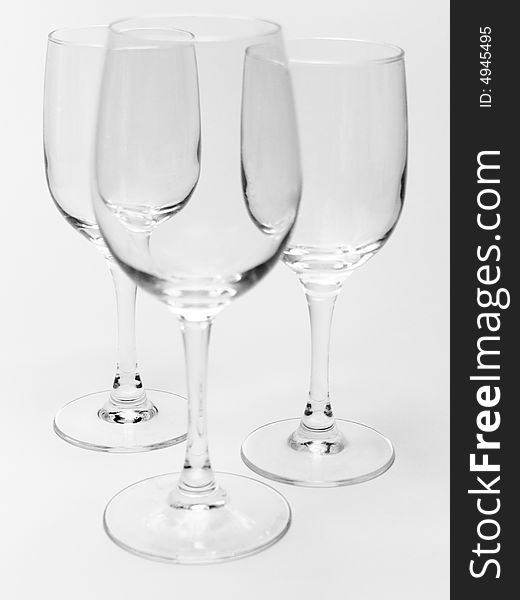 Three wineglasses on a background