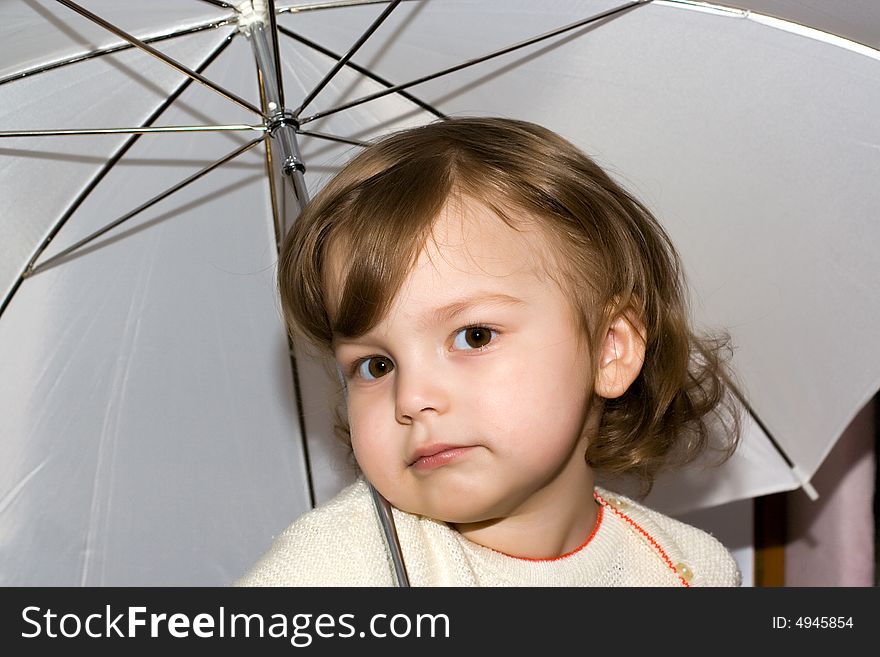 Girl with sunshade in pose