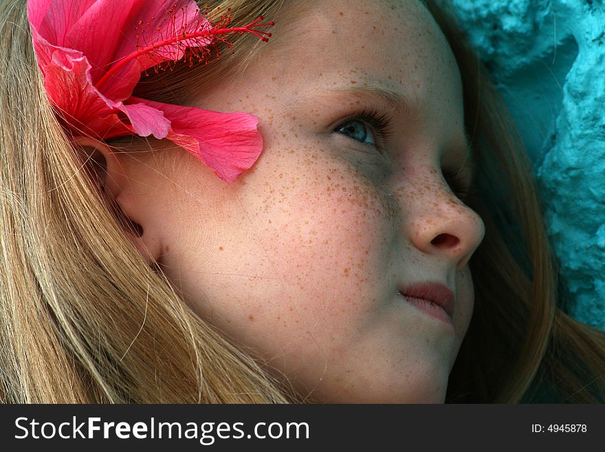 A white caucasian girl child with a sad lonely expression on her face. A white caucasian girl child with a sad lonely expression on her face