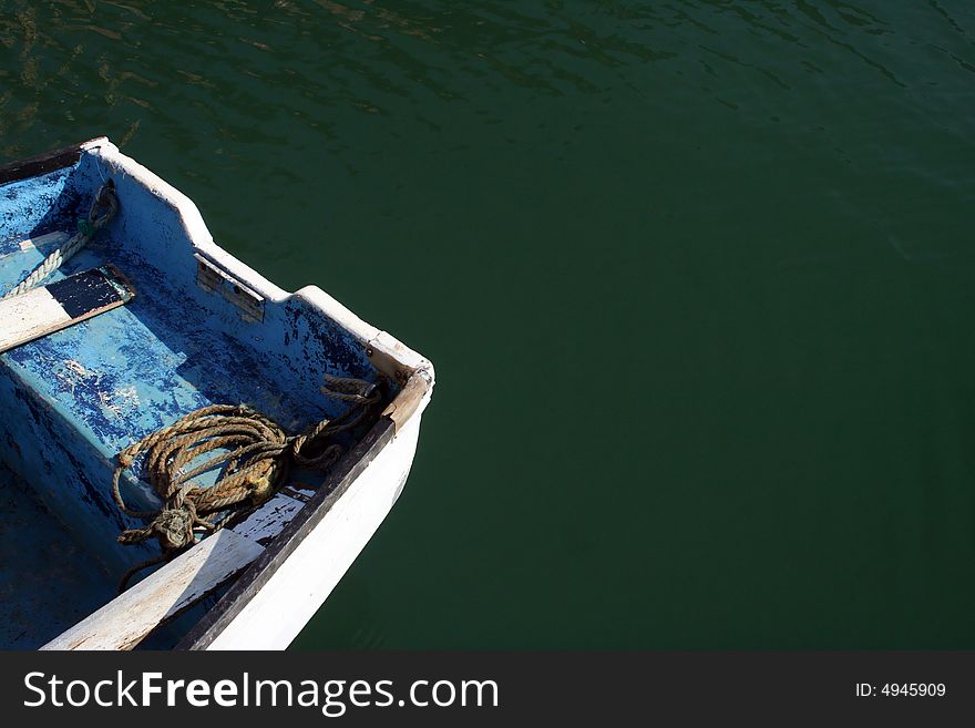 Boat detail in green deep waters