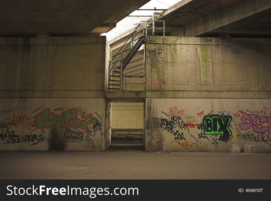 Graffiti under a highway bridge,