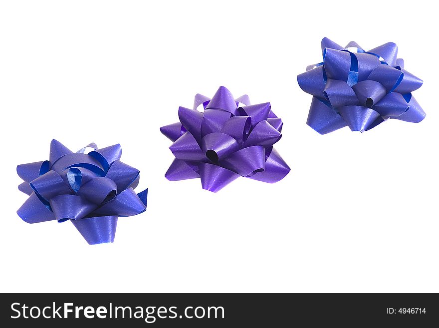 Violet and blue bows to be used in placing on top of items - gifts, products, etc.