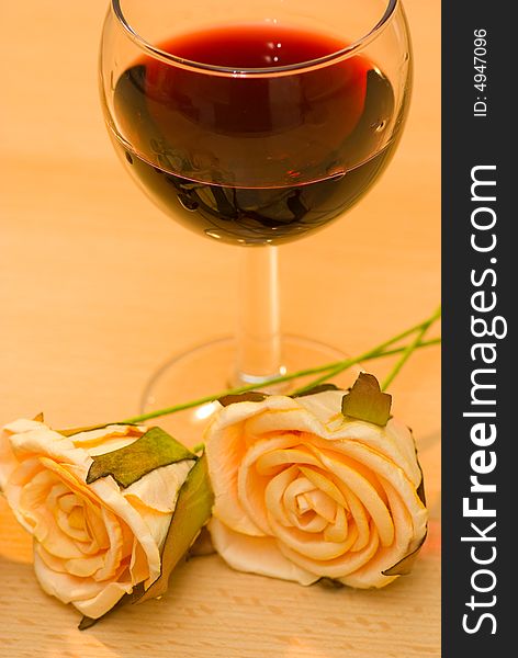Two rose with red wine. Two rose with red wine