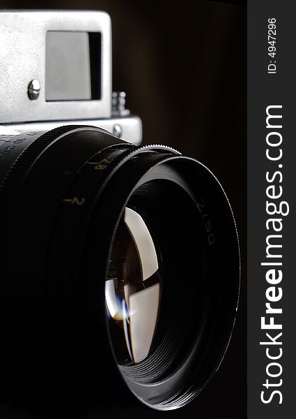 A close up on lens of rangefinder camera. A close up on lens of rangefinder camera