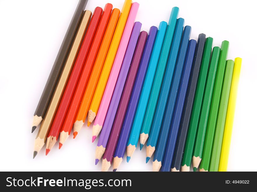 Multicolored pencil on white background