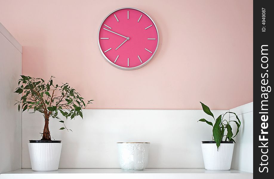 Decoration with pink wall clock. Decoration with pink wall clock