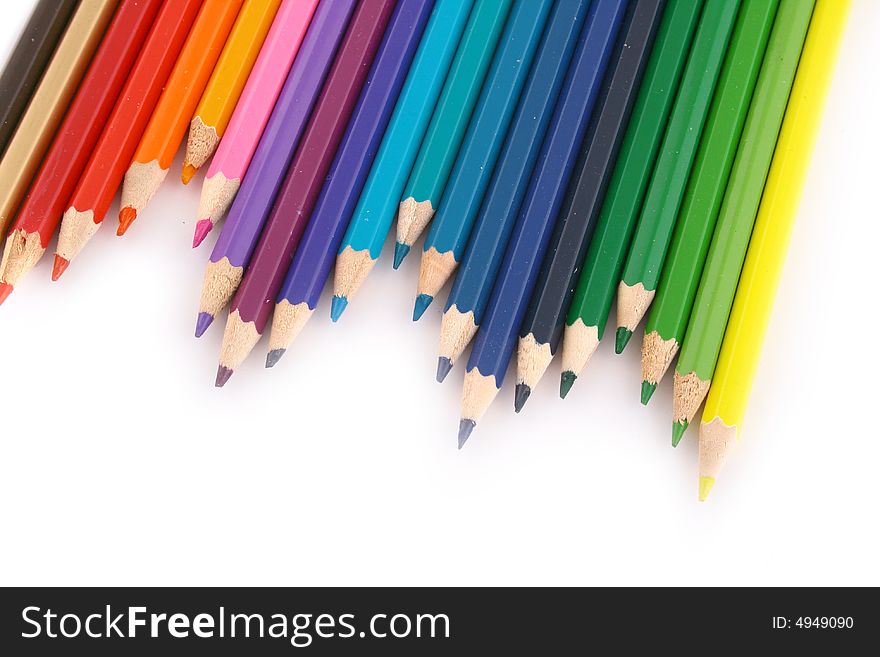 Multicolored pencil on white background