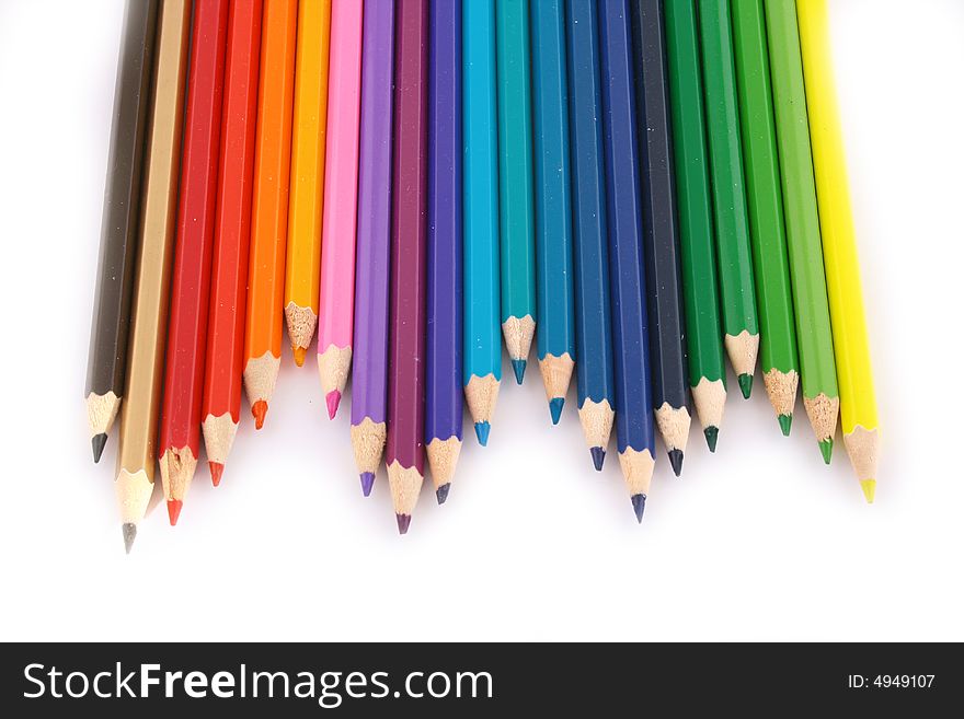 Multicolored pencil on white background