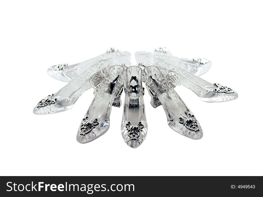 Crystal slippers arranged in a circle with silver accents. Crystal slippers arranged in a circle with silver accents