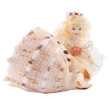 Toy Girl With Seashell Royalty Free Stock Photos