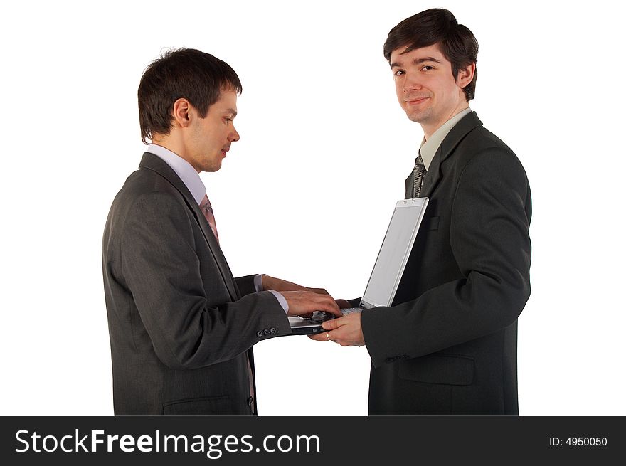 Two young businessmen working isolated on white