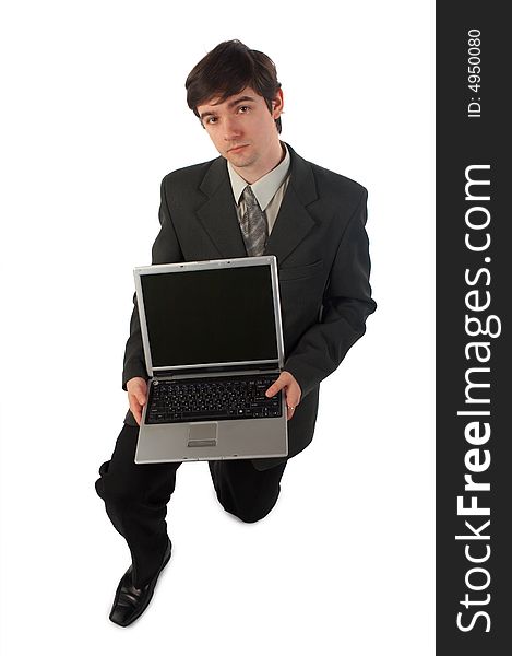 Young businessman show laptop isolated on white