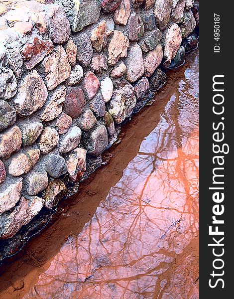 Natural stony stream in a wood. Natural stony stream in a wood.