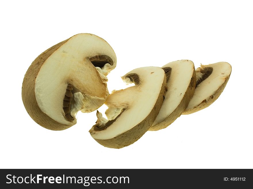 Half mushroom and slices  on white background