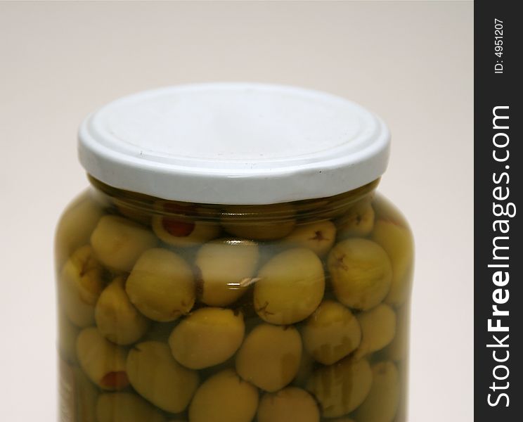 Olives with paprika in a glass